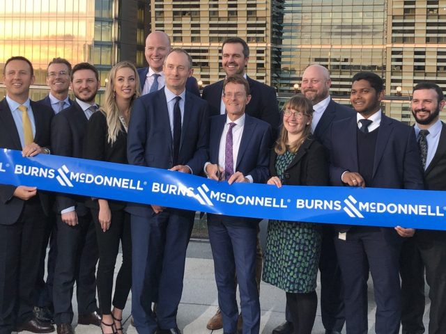 Burns & McDonnell cutting the ribbon outside their new offices.