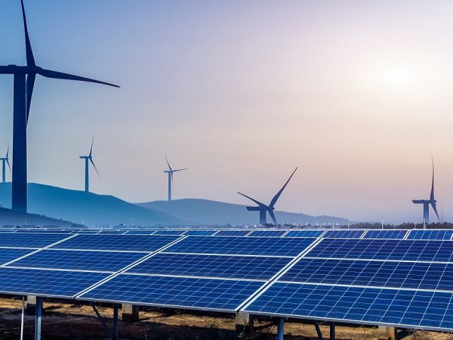 Solar panels and wind turbines.