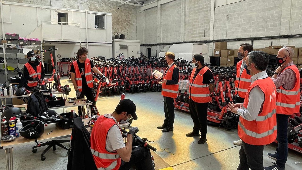E-scooters reducing carbon emissions.