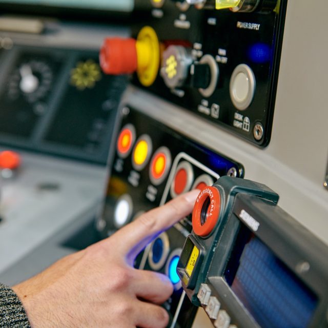 Buttons inside a train simulator.