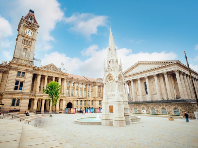 Fountain and church like spire in Chamberlain Square, Paradise Birmingham.