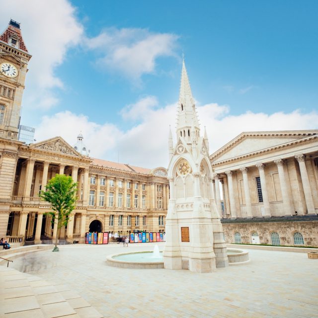 Fountain and church like spire in Chamberlain Square, Paradise Birmingham.