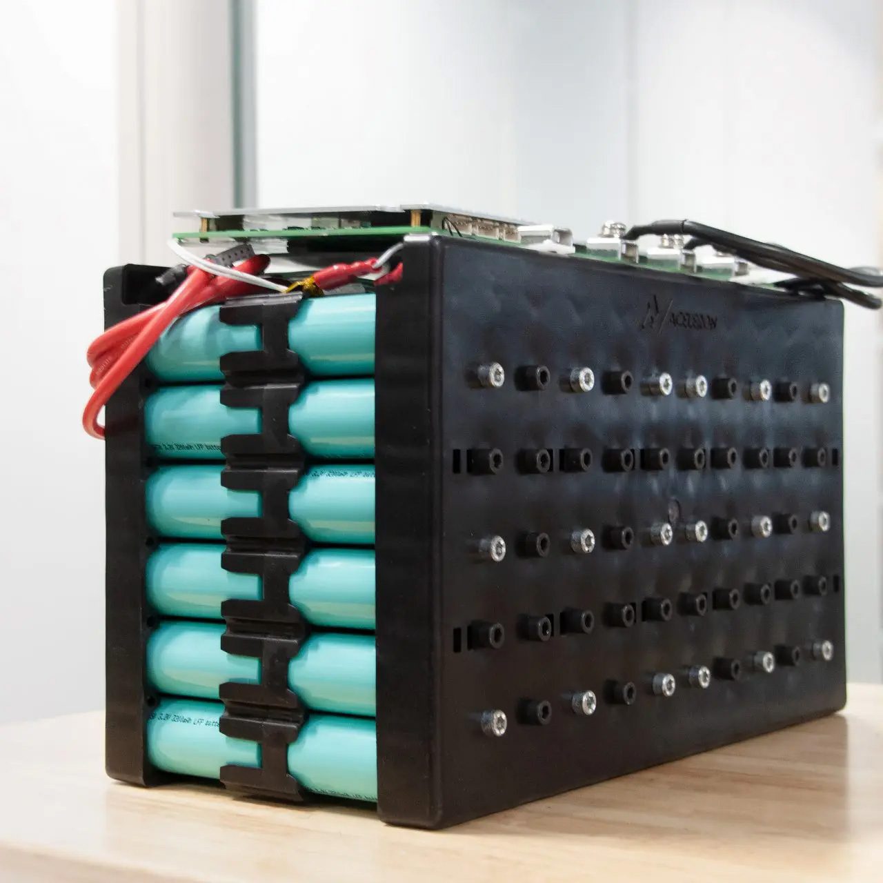 A block of interconnected batteries.