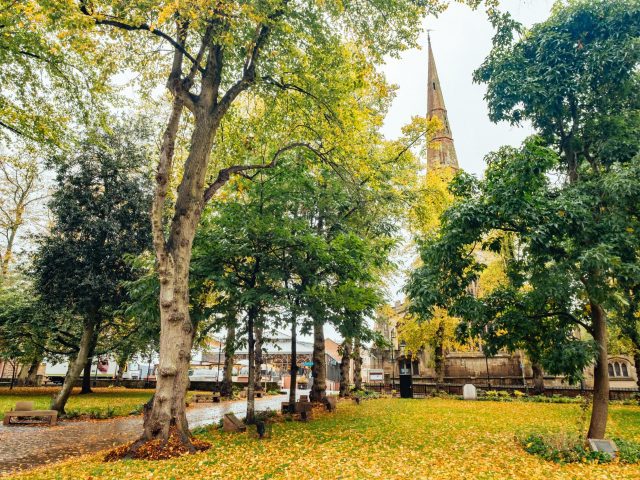 Park area next to a church.