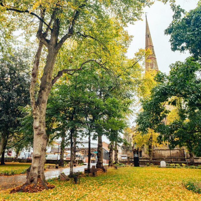 Park area next to a church.