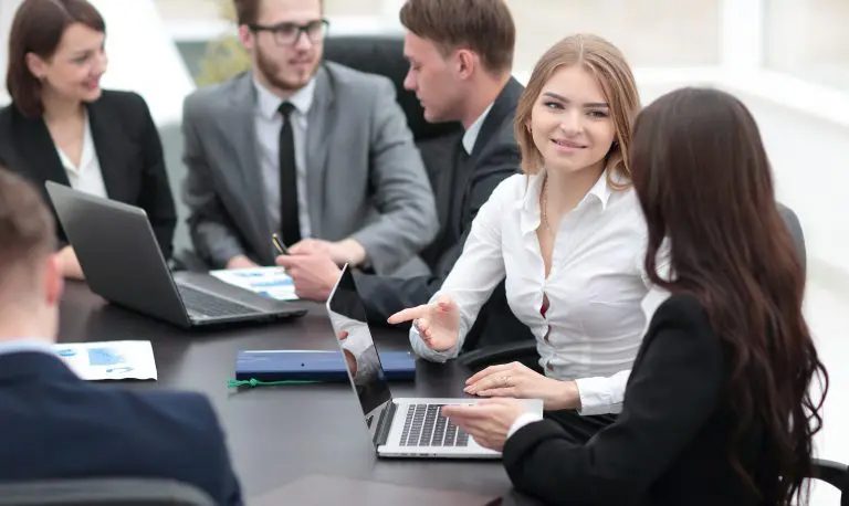 A group of people having a business meeting.