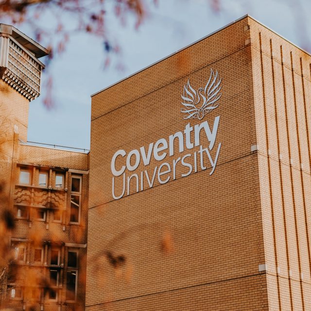 Coventry University logo on the side of a building.