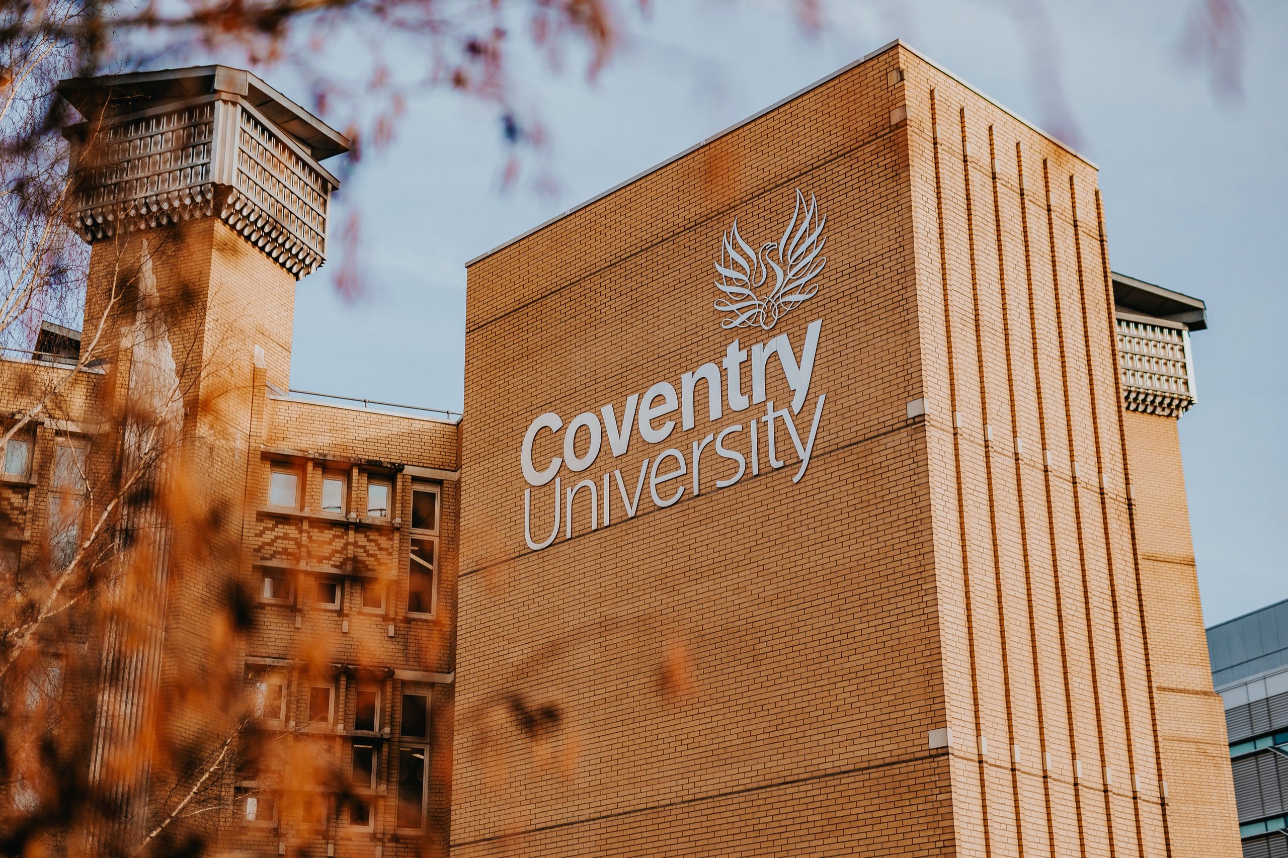 Coventry University logo on the side of a building.