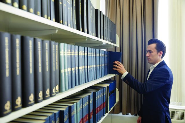 Books on shelves at a law school.