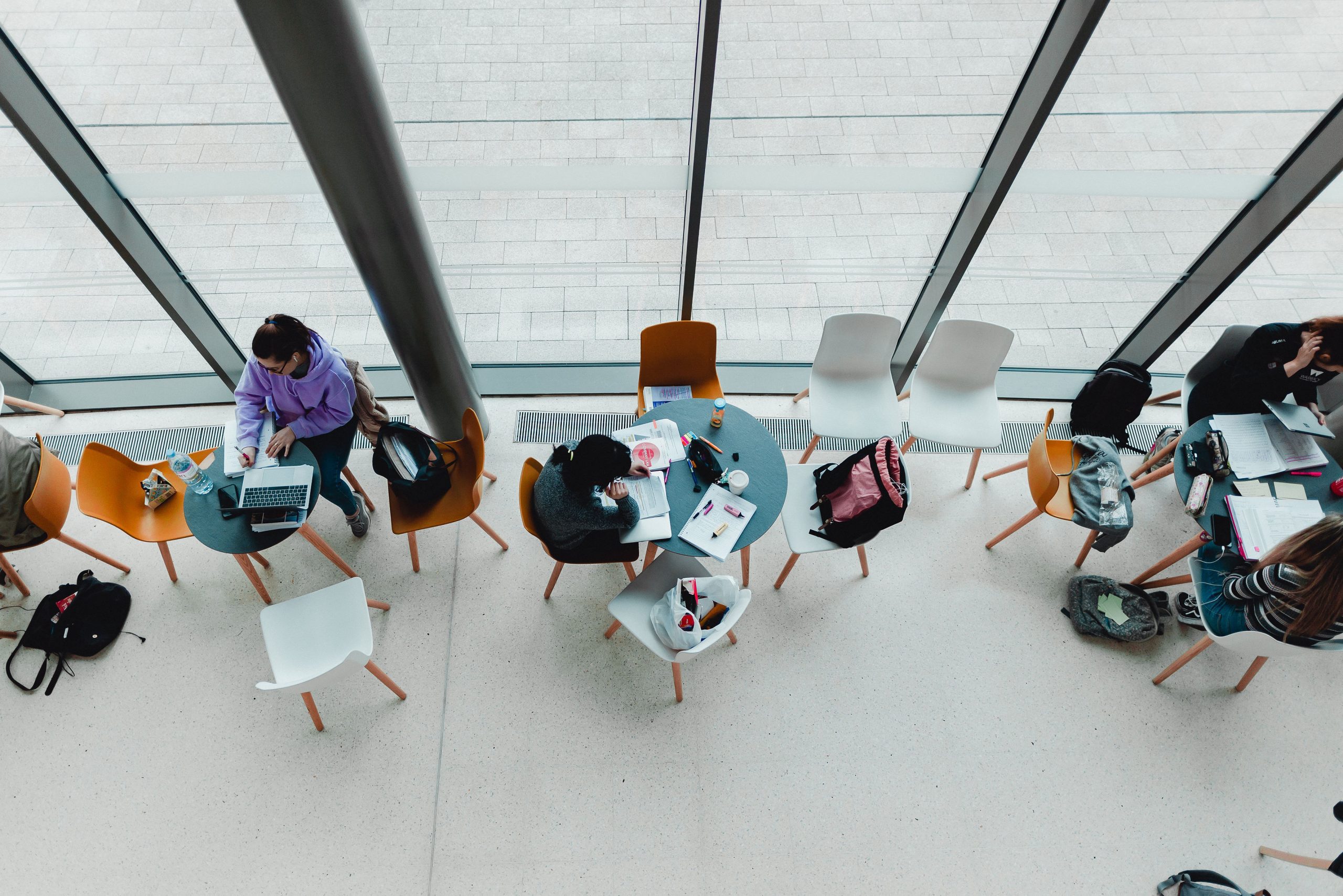 People working in a café style setting.