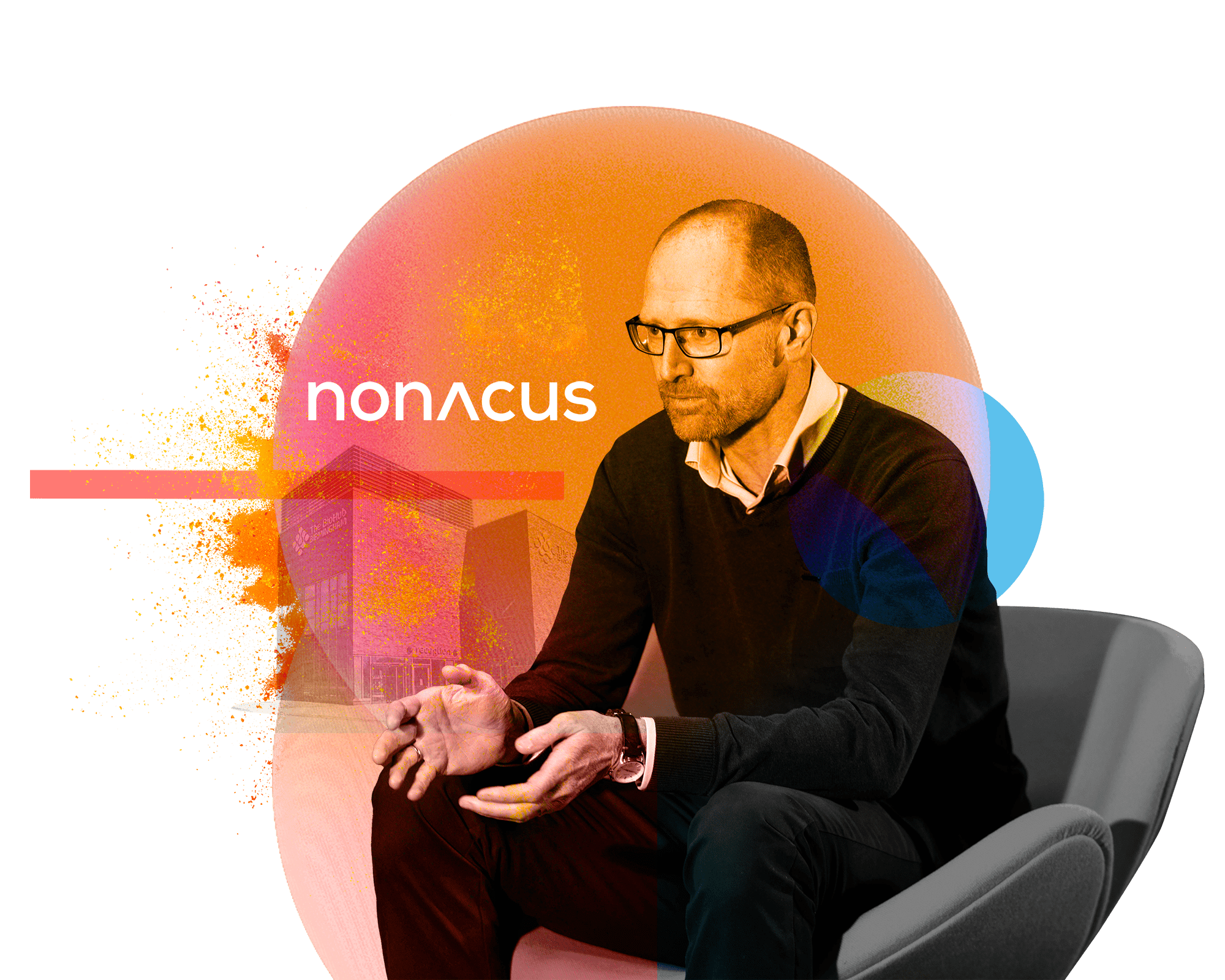 Chris Dale of Nonacus sits in an interview chair with the title of the company behind him.